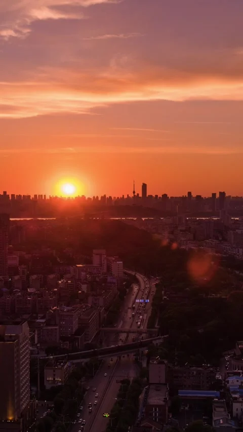 Vertical Wuhan City Skyscraper Sunset Glow Urban Motion Timelapse Stock Footage 327674649