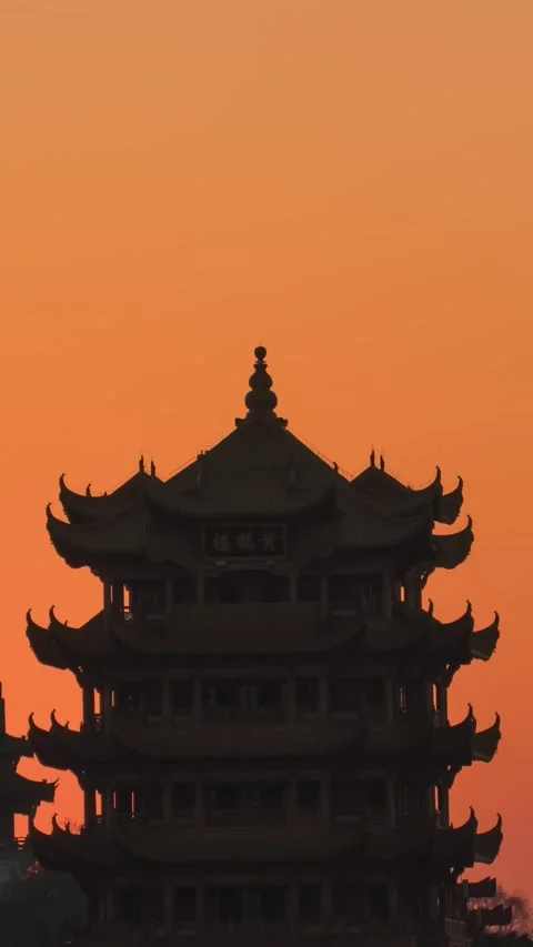 Vertical Wuhan Yellow Crane Tower Sunrise Timelapse with Golden Sun and Clouds Stock Footage 327600575