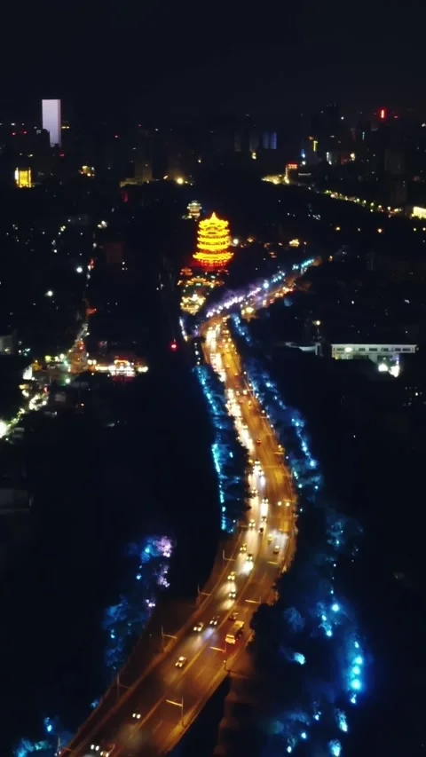 Vertical Yellow Crane Tower Night Aerial Drone Cityscape Motion Stock Footage 327678775