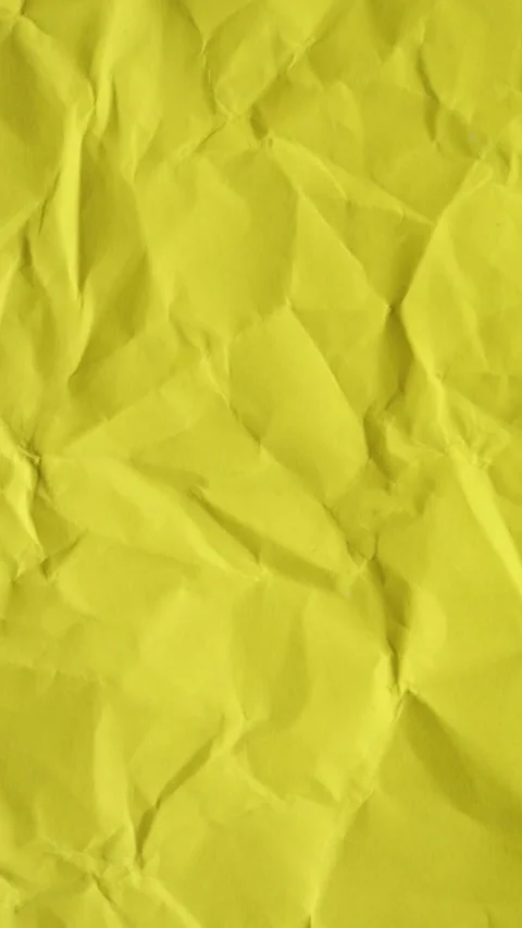 Vertical Yellow Crumpled Paper Texture Background Loop Vídeos de archivo 333965095