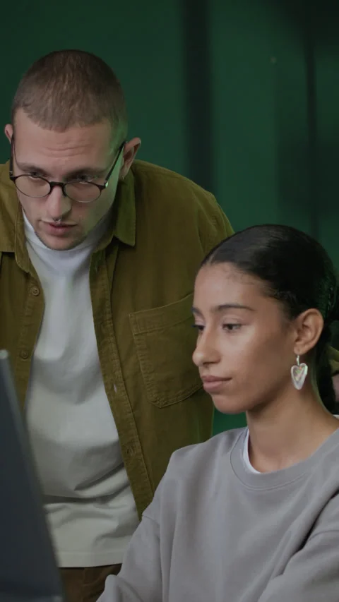 Vertical of Young Diverse Programmers Teaching Process in Computer Office 스톡 동영상 299680741