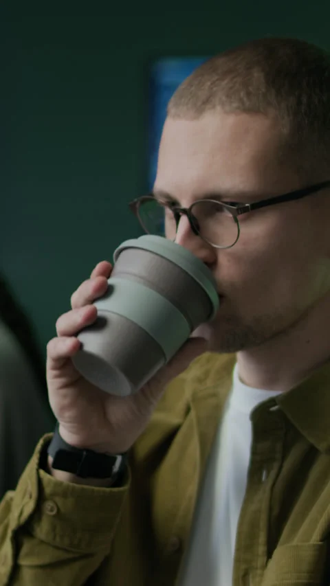Vertical of Young Male Programmer Working in Office at Nighttime Stock-Footage 292901430