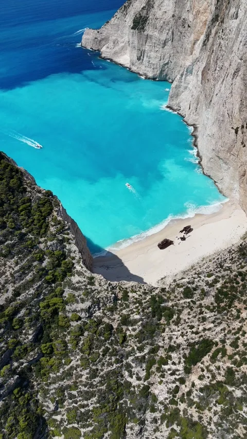 VerticalAerial Drone View of Navagio Beach (Shipwreck), Zakynthos Island, Greece Video stock 313495771