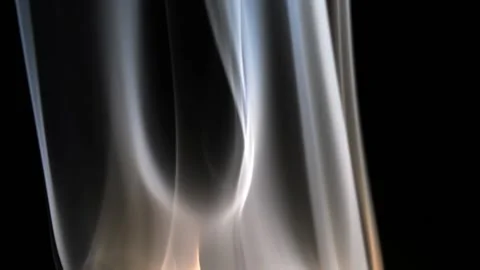 Vertically drawn smoke on a black background creating abstract lines Stock Footage 132164157