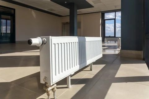 Vertically installed central heating radiator Фото