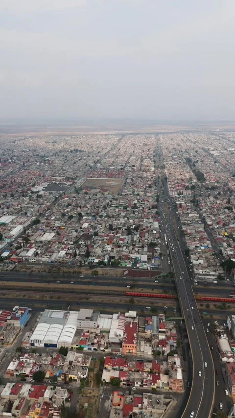 Vertically oriented drone views of the Ecatepec area, north of Mexico City Stock Footage 309613198