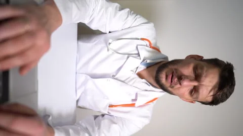 Vertically oriented video of a young family therapist who consults a patient Stock Footage 145849540