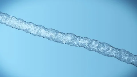 Vertically pouring water is twisting on blue background (slow motion, full hd) Stock Footage 86772761