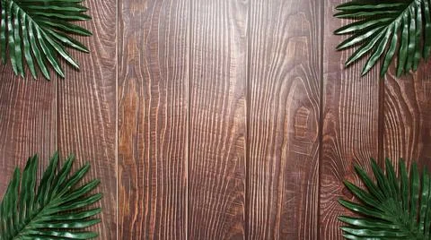 The vertically spaced brown plank background has a distinct wood grain patter Stock Photos