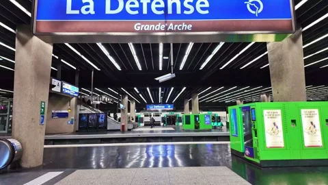 Vertically tilted shot of La Defense metro station interior with platform and Stock Footage 302777122