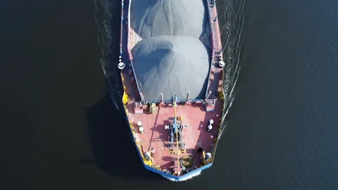Vertically view of dry cargo ship with gravel from drone. 스톡 동영상 97900655