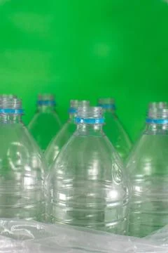 Verticam image of a pack of 8 empty and recyclable plastic water bottles, wit Stock Photos