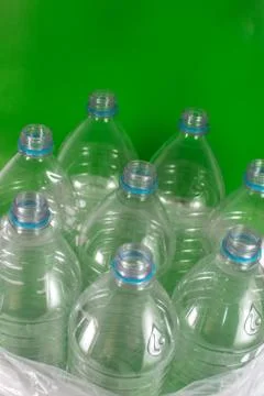 Verticam image of a pack of 8 empty and recyclable plastic water bottles, wit Stock Photos