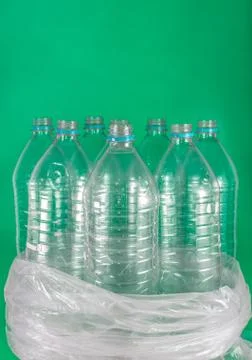 Verticam image of a pack of 8 empty and recyclable plastic water bottles, wit Stock Photos