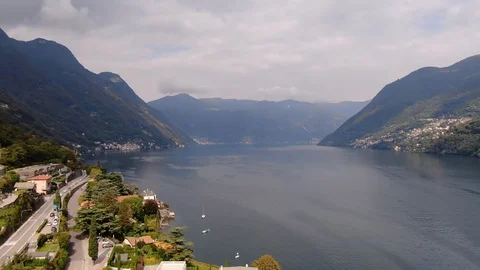 Vertigo effect during aerial view of mountains on Lake Como in Italy Stock Footage 130074588