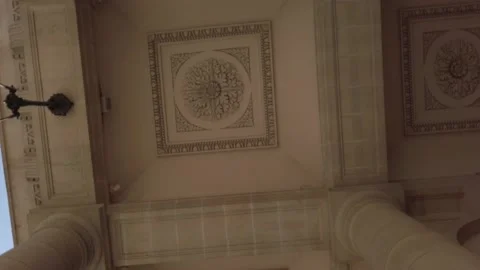 Vertigo spinning shot of ceiling architectural detail of portico in Paris 스톡 동영상 131221309
