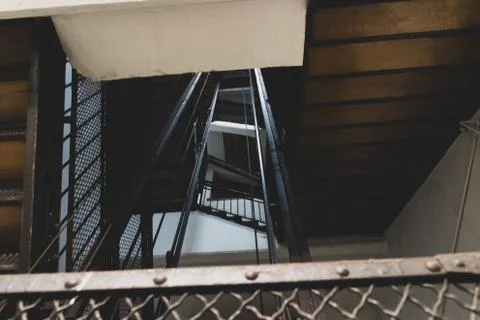 Vertigo stairs without light on the end Stock Photos