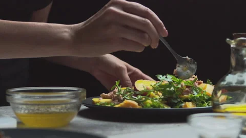 Very appetizing fruit and vegetable salad, beautiful women's hands gently Video stock 135259794