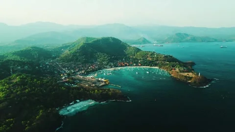 A very beautiful beach surrounded by trees at the Bali island Stockbeeldmateriaal 269550926