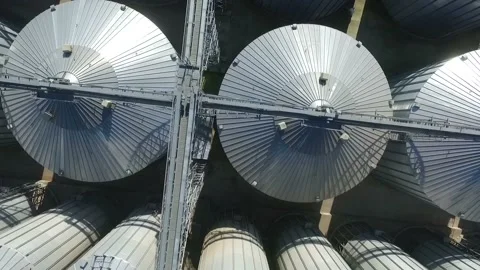 Very beautiful circular flight over the elevator. Many metal cans. Stock Footage 101782941