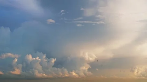 Very beautiful cloudscape in the rays of setting sun after the rain Stock Footage 283003486
