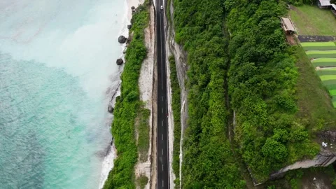 Very beautiful drone view over the coastline with a road, 2K Stock Footage 246101376