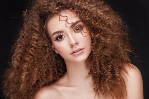 Very beautiful girl model with afro curls Stock Photos