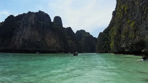 Very beautiful The Phi Phi Island, View of Boat and Cave with tourist  Stock Footage 151476416