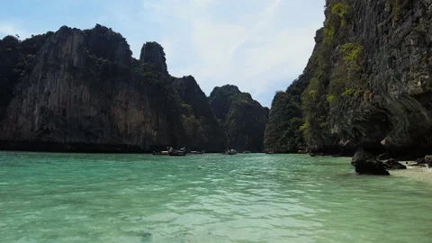 Very beautiful The Phi Phi Island, View of Boat and Cave with tourist  Stock Footage 151477115
