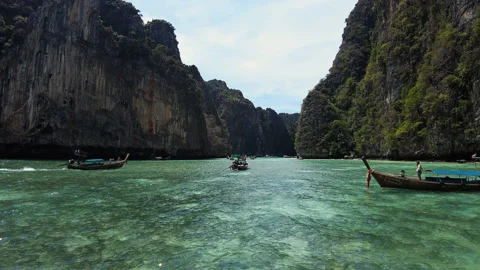 Very beautiful The Phi Phi Island, View of Boat and Cave with tourist  Stock Footage 151479280