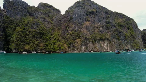 Very beautiful The Phi Phi Island, View of Boat and Cave with tourist  Stock Footage 151480663