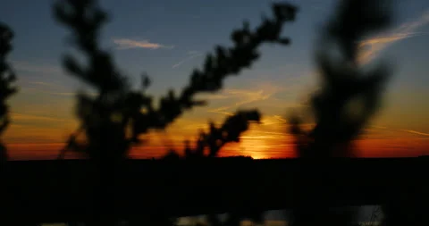 Very beautiful sunset, the sun is setting over the horizon. Stock Footage 153880128