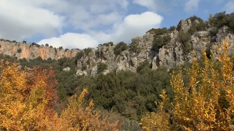 Very beautiful view  on the a mountain range,  garden and sky in the background. Stock Footage 72465343