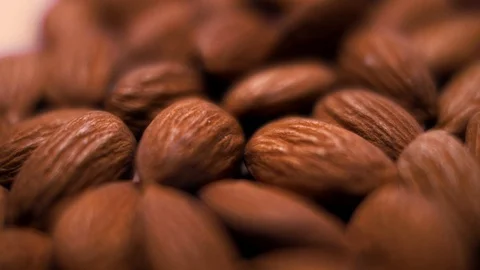 A very close-up of peeled almonds. Macro Stock Footage 102710911