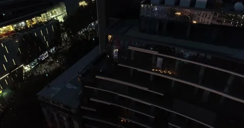 Very close shot on a rooftop with drone at night Stock Footage 142165302