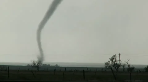 Very close Tornado passes through frame from left to right. Stock Footage 11436072