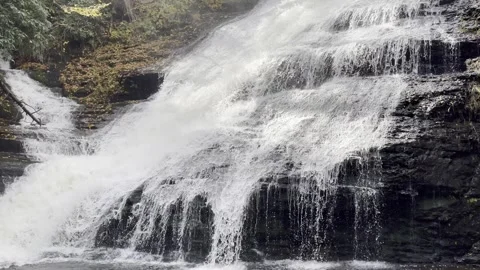 Very close view of a loud waterfall in the autumn season. Stock Footage 262128799