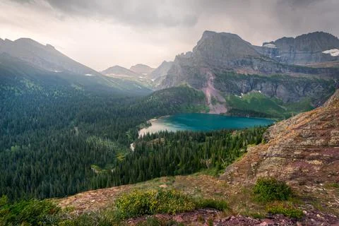 Very cloudy day above lower Grinnell Lake in Glacier National Park, Montana, USA Stock-Fotos