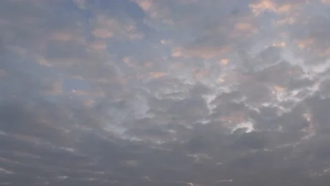 Very cloudy sky at sunrise - background - time lapse Stock Footage 143345483