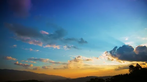 Very colorful day to night time lapse of clouds at sunset in the tropic. Stock Footage 59105752