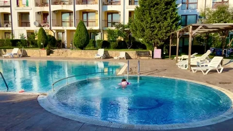 A very comfortable pool for both children and adults in a resort complex Stock Footage 251706510