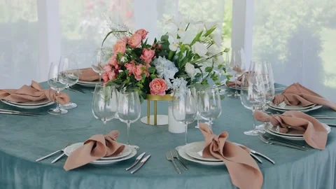 A very cool festive table on which there are cutlery and flowers Stock Footage 229726404