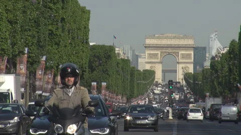 Very crowded boulevard champs Elysees in Paris, parisian car traffic, monument  Stock Footage 51655130
