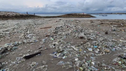Very Dirty Beach Tons of Plastic Trash Environmental Disaster Bali Indonesia Stock Footage 146056534