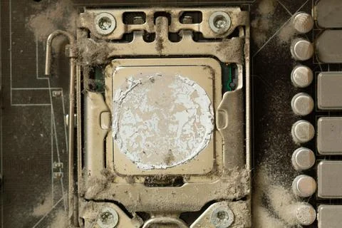 Very dirty computer processor. Dusty CPU microchip on a computer motherboard 스톡 사진