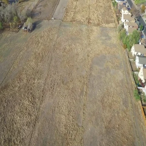 A Very Distorted Aerial View of Various Plots of Land and Homes COLORADO Stock Footage 69427804