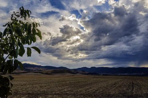 Very dramatic sky over the Navarra's fields Stock Photos