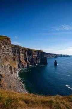 On the very edge of the Cliffs of Moher. Photos