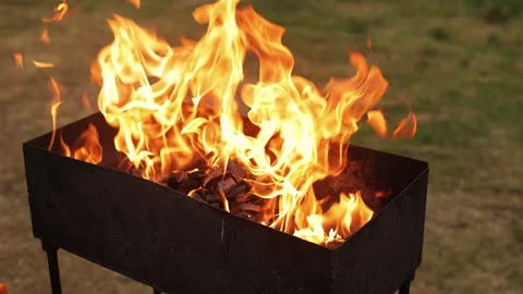 Very fast ignition of the fire in the grill Stock Footage 249413388