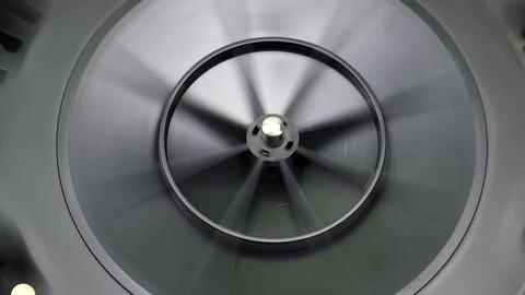 Very fast spinning. Gaining momentum. rotation technology. Close-up, high angle Stock Footage